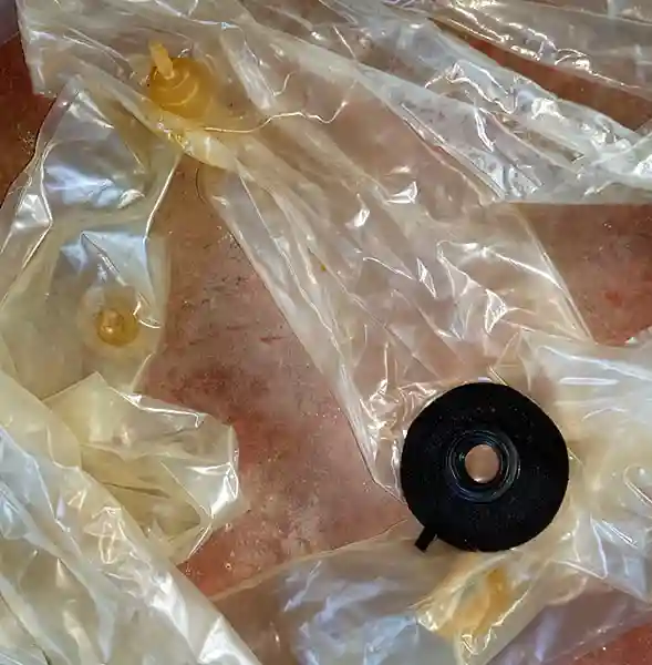 Kite bladder repair at JBay Kiteboarding Curaçao in St. Joris Bay